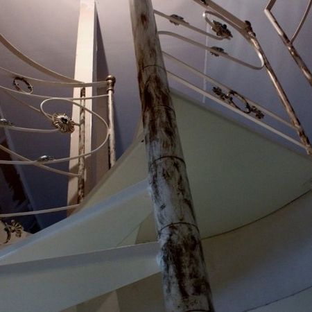 21. Schmiedeeisenwendeltreppe