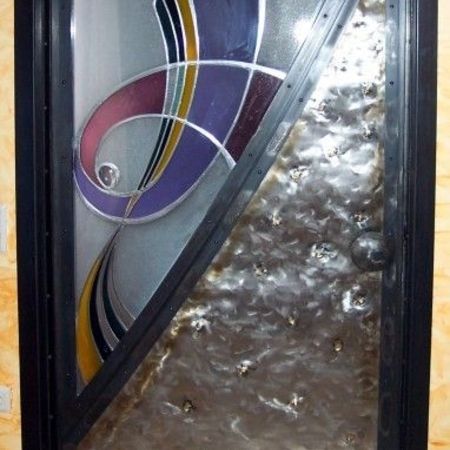 42. Schmiedeeisenglastür