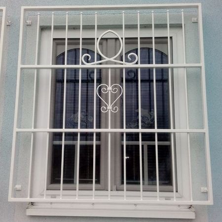 23. Schmiedeeisenfenstergitter